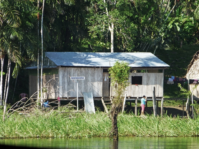 Hut on the Orosa River (note single solar panel, provided by the Peruvian government)